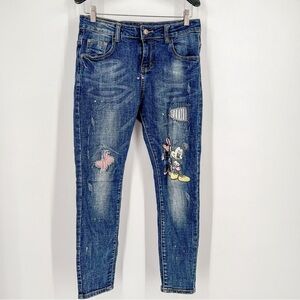 Skinny jeans with Mickey Mouse and distressed